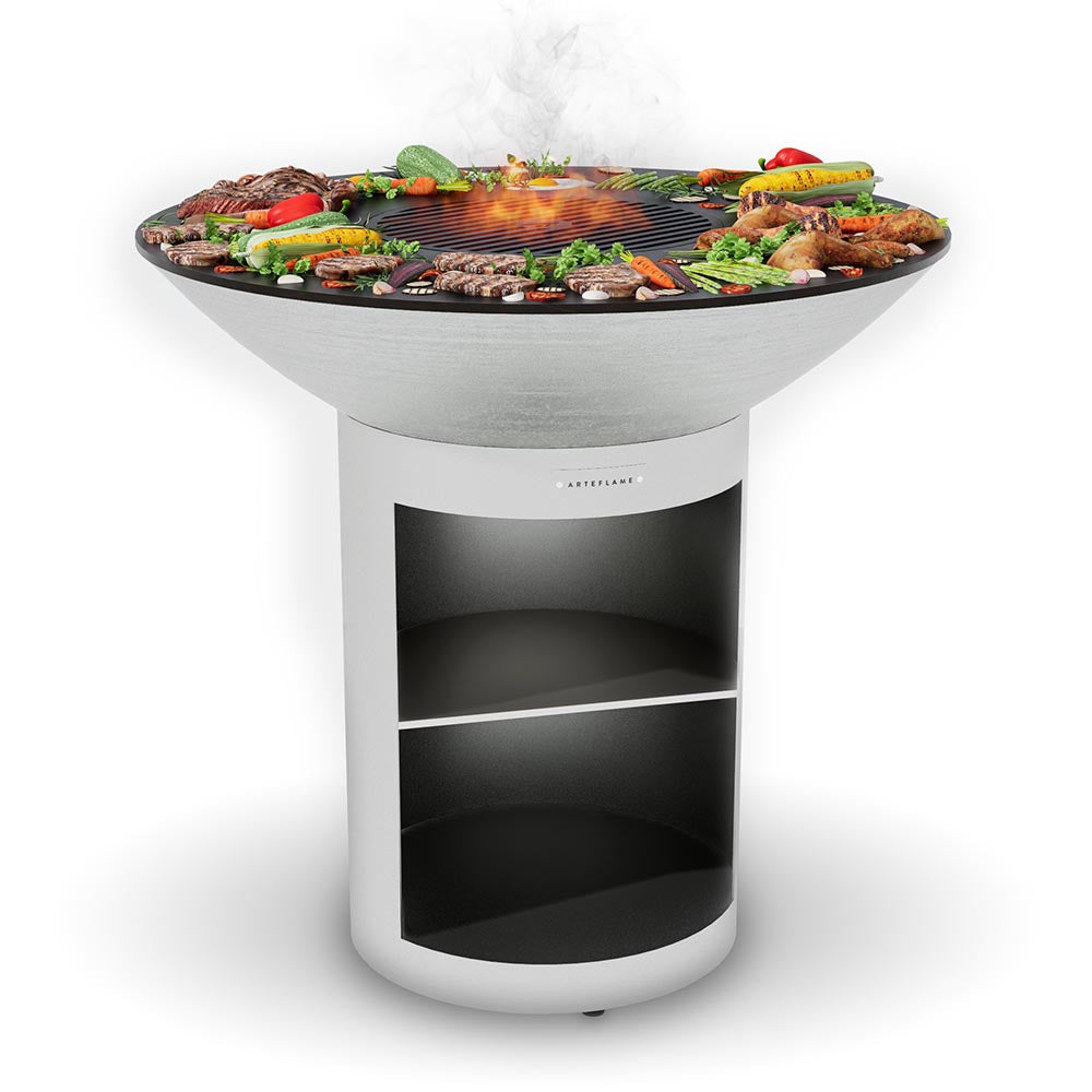 Arteflame 40 stainless grill on the stainless storage base with food on the cooktop