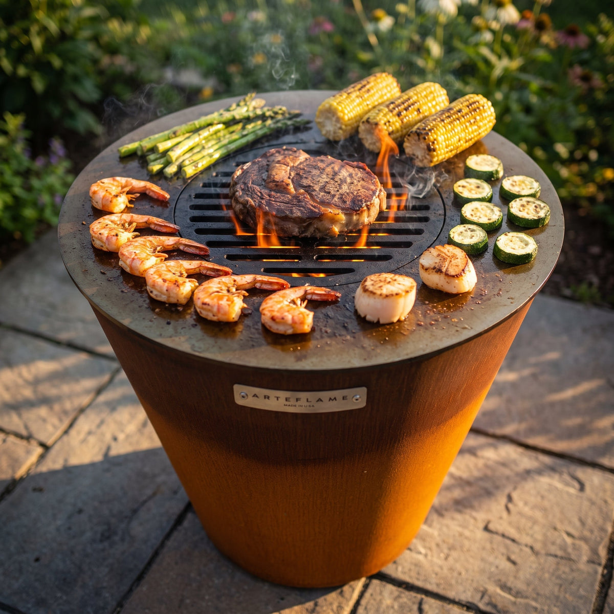 Arteflame ONE20 with shrimp, corn and a ribeye on the cooktop