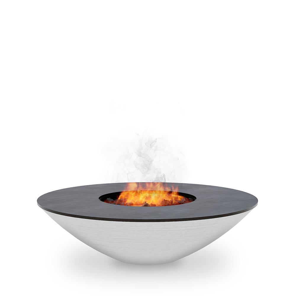Arteflame 40 stainless fire pit with cooktop and a fire in the center