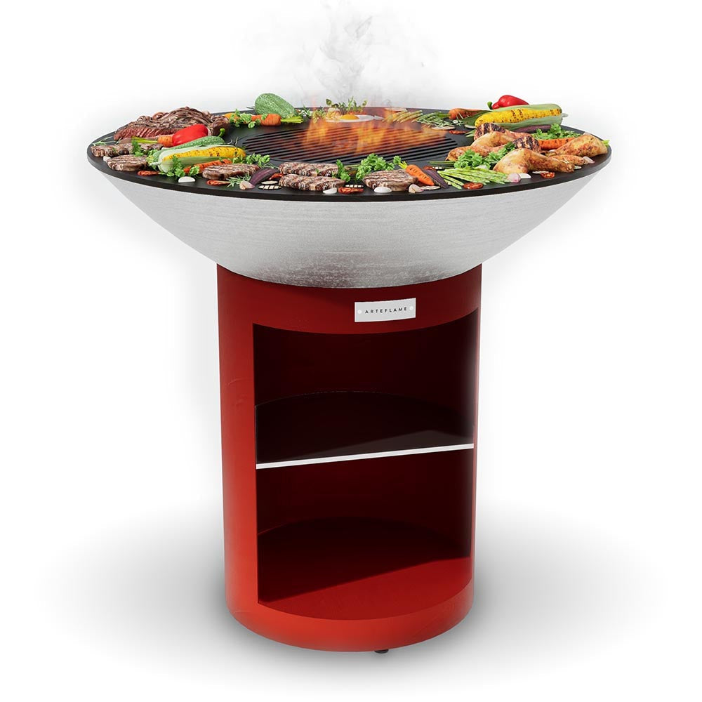 Arteflame 40 stainless grill on the red storage base with food on the cooktop
